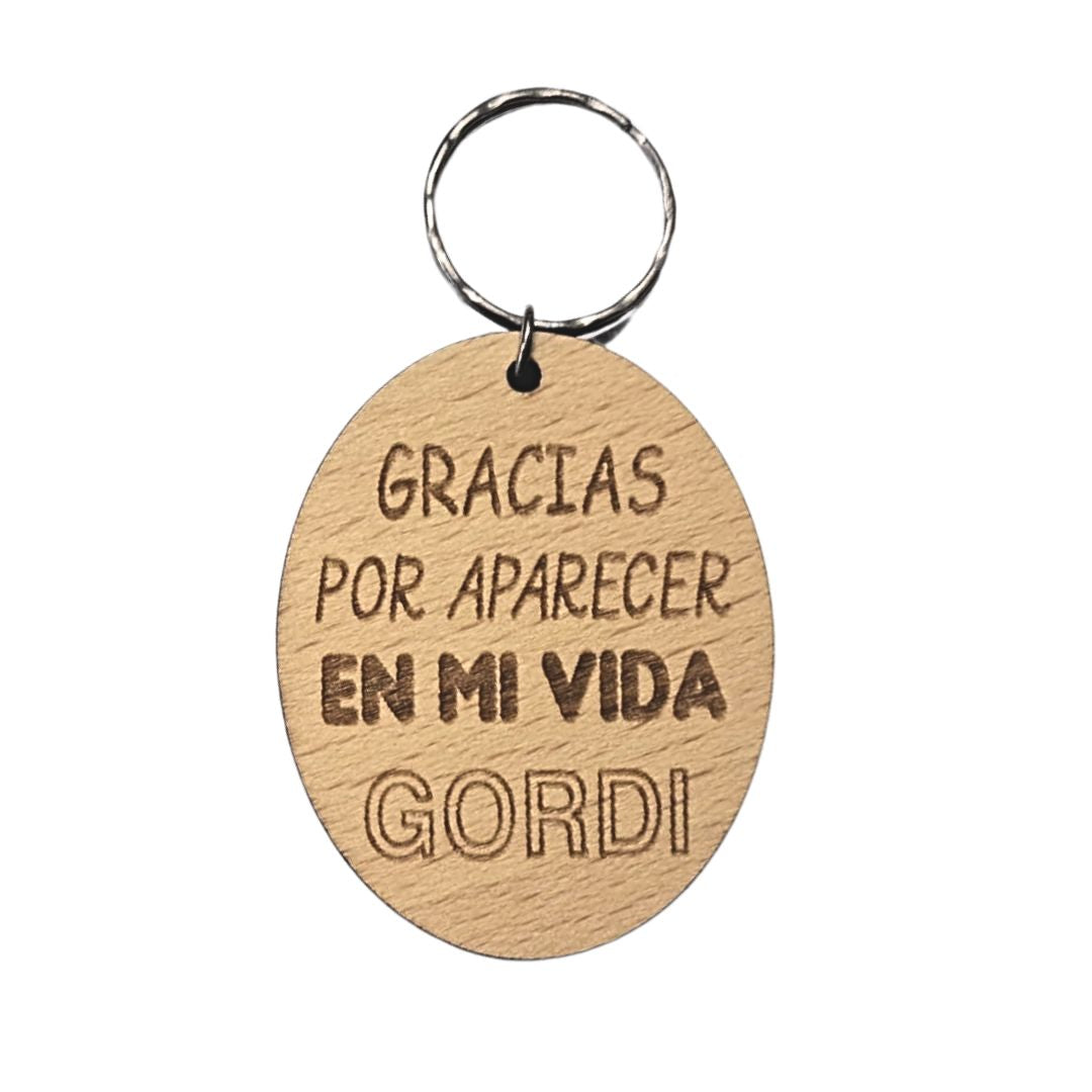 Llavero de madera de haya ovalado con la frase grabada a láser: Gracias por aparecer en mi vida Gordi