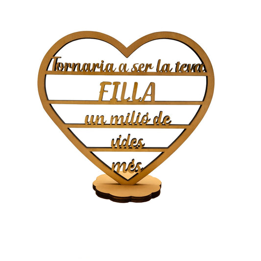 Trofeo en forma de corazón silueteado con base de madera. El corazón tiene cuatro listones horizontales donde se ponen las letras para formar el texto "Tornaria a ser la teva filla un milió de vides més"