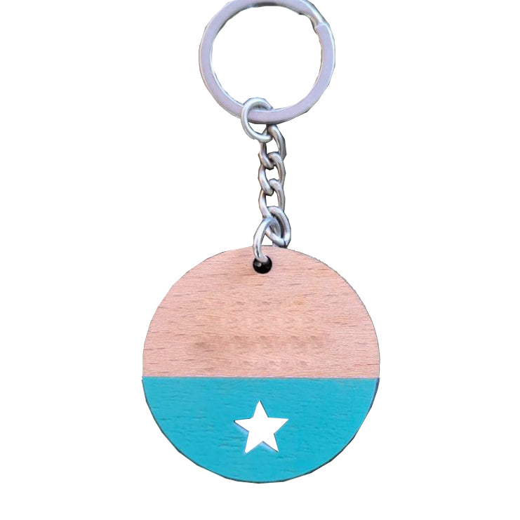 Llavero redondo de madera de haya para personalizar, troquel en forma de estrellay color azul
