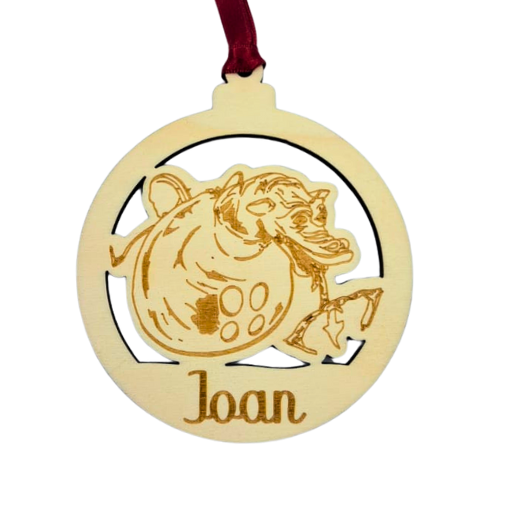 Bolas para el árbol de Navidad de madera con las figuras típicas de la Bisbal: la geganta Rigoberta, el Drac de Dracs i el Drac La Rèplica.