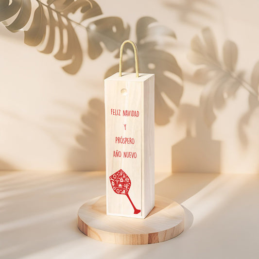 Caja de Madera para botella de vino, edición Navidad con dibujo de una copa de vino roja y el texto "Feliz Navidad y Próspero Año Nuevo"